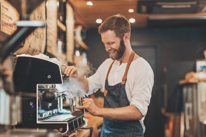 man working at lincoln city coffee shop